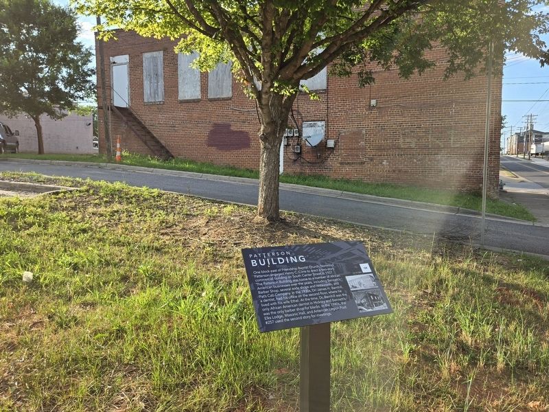 Patterson Building Marker with the Patterson Building in the background image. Click for full size.