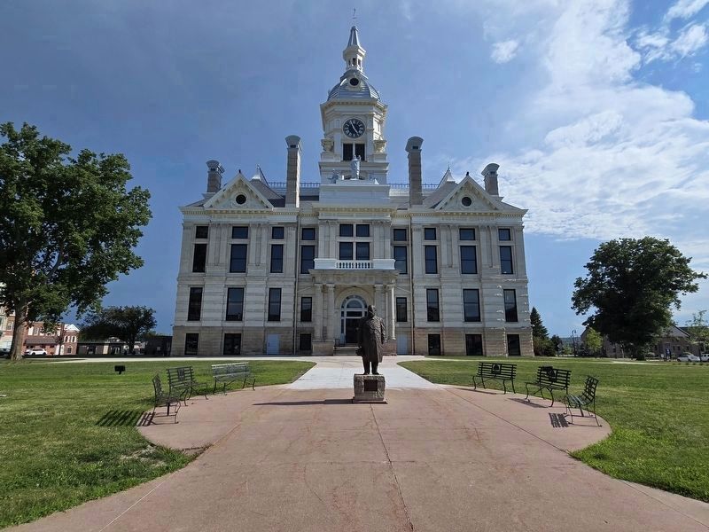 Henry Anson Marker and Statue with Marshall County Courthouse in the background image. Click for full size.