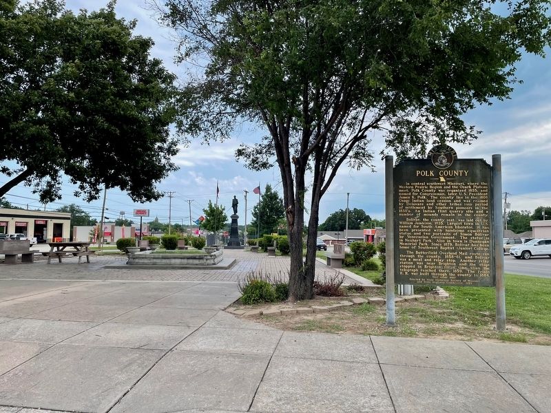 Polk County Marker with statue of Simon Bolivar in background at Neuhart Park.. Click for full size. Polk County Marker with statue of Simon Bolivar in background at Neuhart Park. image. Click for full size.
