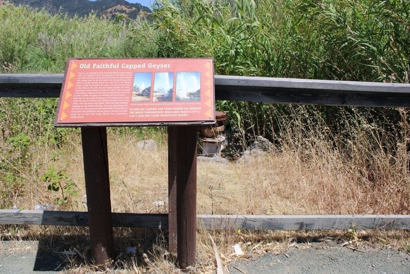 Old Faithful Capped Geyser and Marker image. Click for full size.