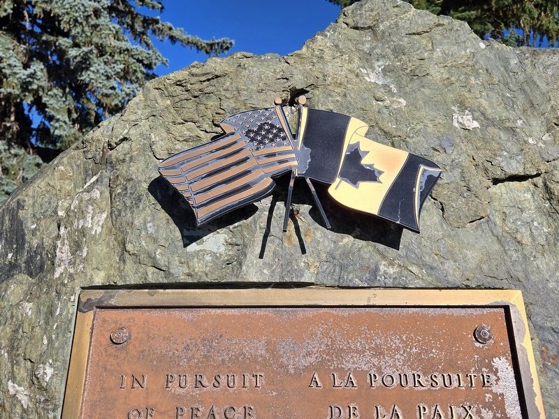 American and Canadian flags above the plaque. Click for full size. American and Canadian flags above the plaque image. Click for full size.