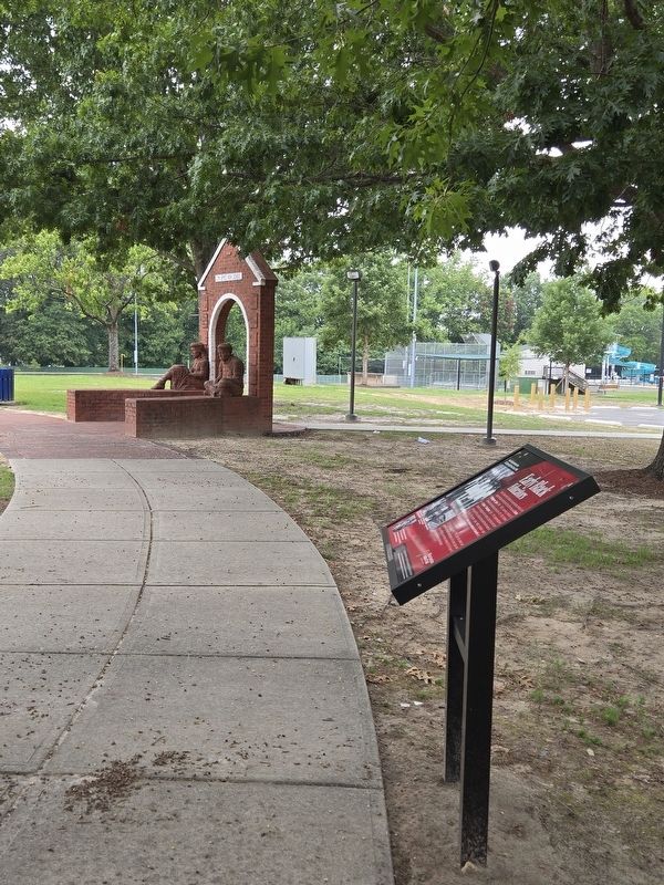 Early Black Educators Marker. C.M. Eppes High Arch in the background. Click for full size. Early Black Educators Marker. C.M. Eppes High Arch in the background image. Click for full size.