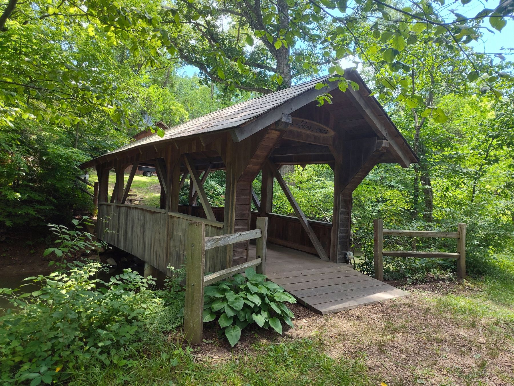 The Veterans Memorial Timberframe Covered Bridge Marker image. Click for full size.