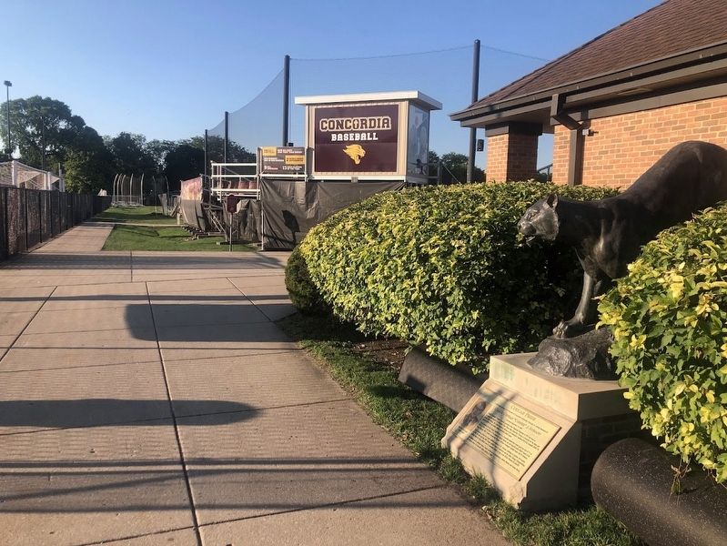 Coach Conrad "Connie" J. Aumann Marker and statue image. Click for full size.