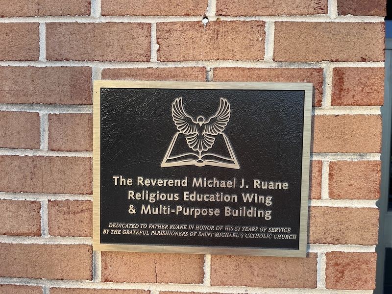 Dedication plaque on the building image. Click for full size.