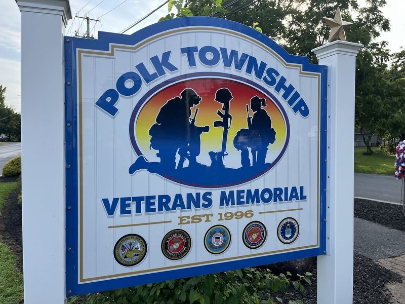 Signage on the grounds of the memorial image. Click for full size.