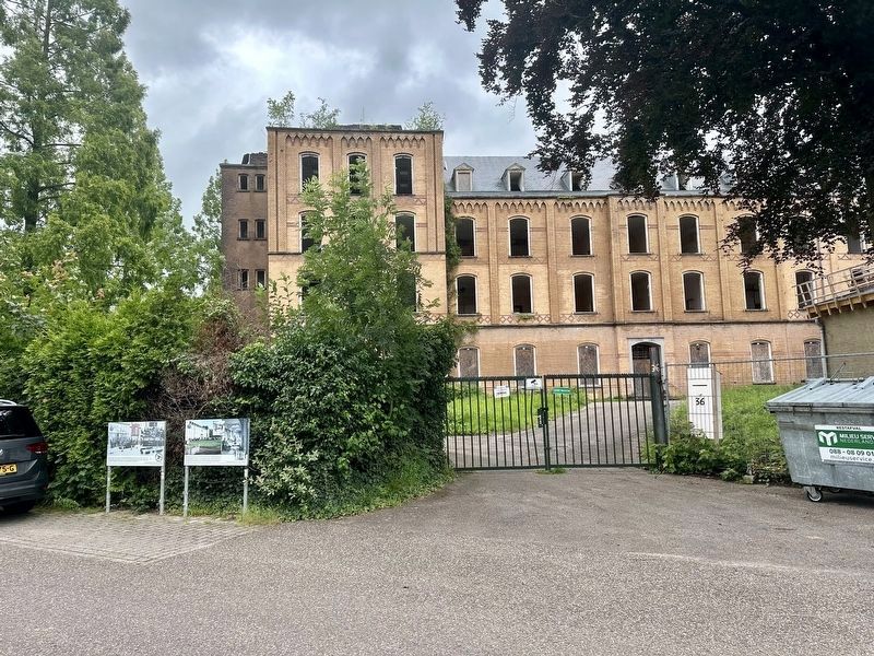SS Reichschule / 91st Evacuation Hospital Marker - wide view image. Click for more information.