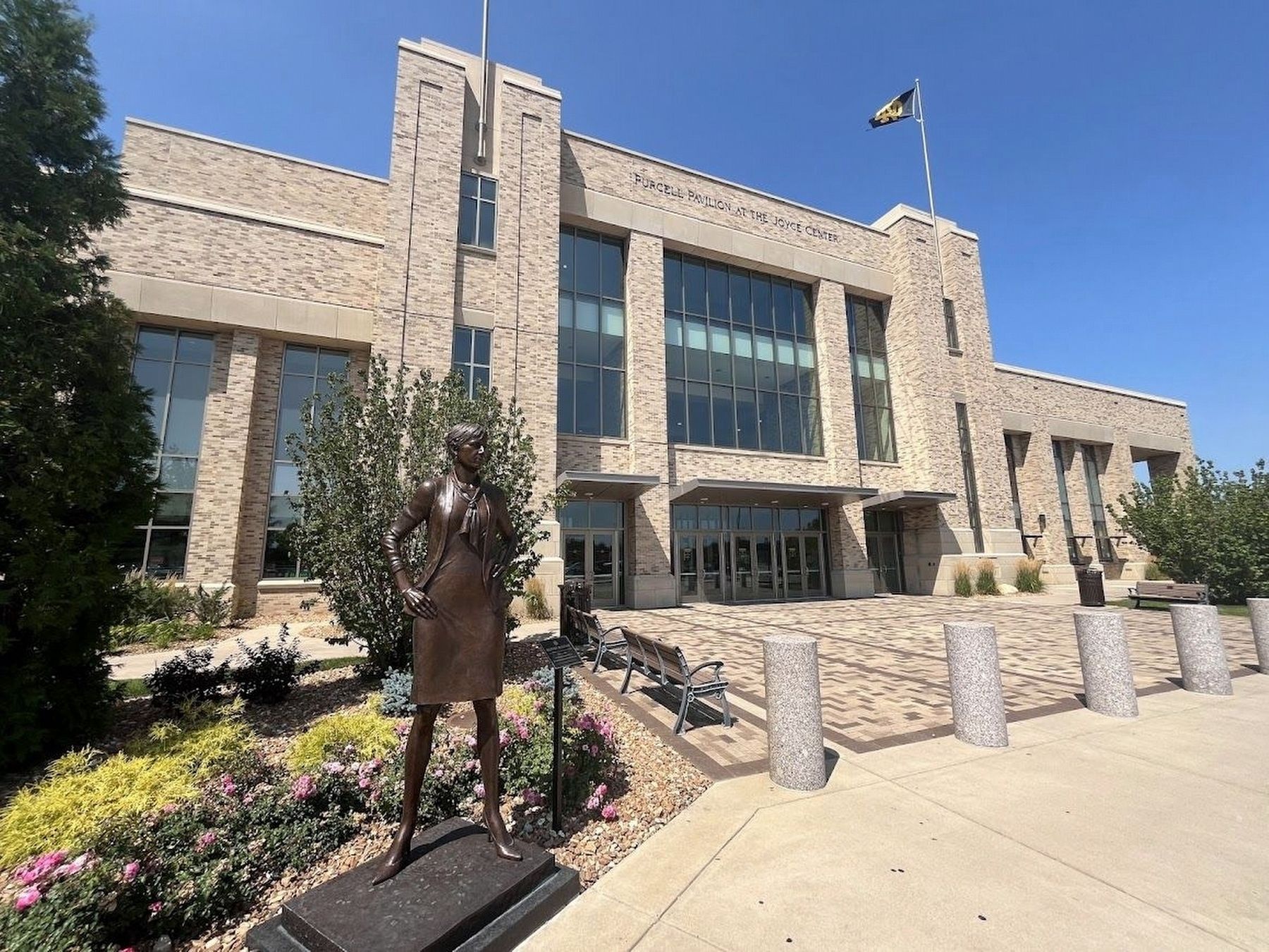 Muffet McGraw statue and marker in front of Purcell Pavilion image. Click for full size.