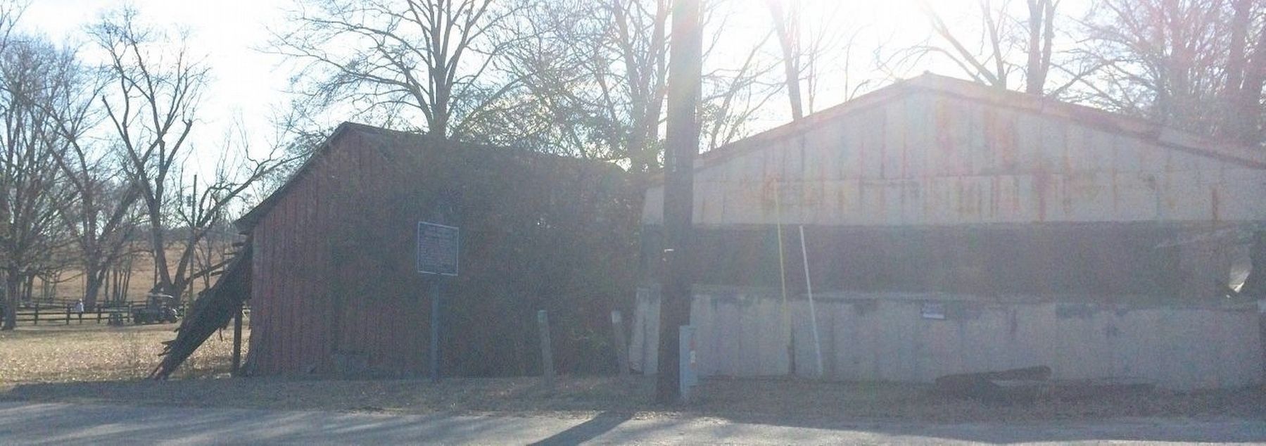 Fort Cusseta Marker with former fort (inside metal shed) and current 1978 nearby barn.. Click for full size. Fort Cusseta Marker with former fort (inside metal shed) and current 1978 nearby barn. image. Click for full size.