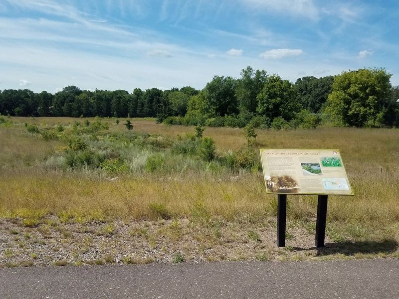Stormwater Marker overlooking the southern infiltration basin in Gladstone Savanna. Click for full size. Stormwater Marker overlooking the southern infiltration basin in Gladstone Savanna image. Click for full size.