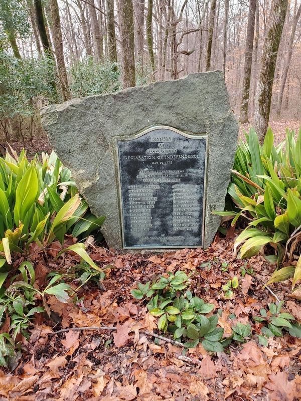 Monument reset into a planter image. Click for full size.