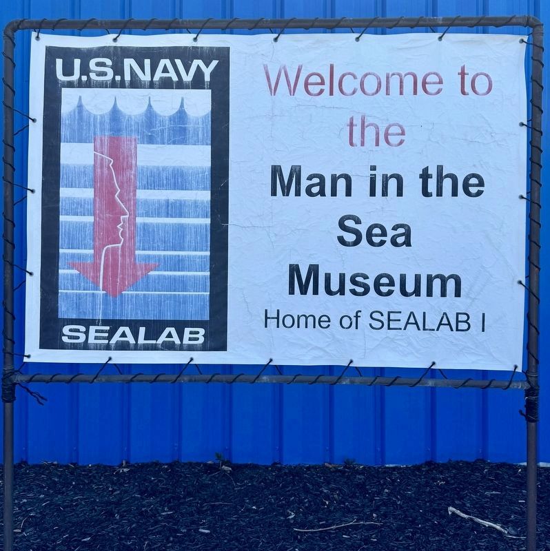Man in the Sea Museum sign image. Click for full size.
