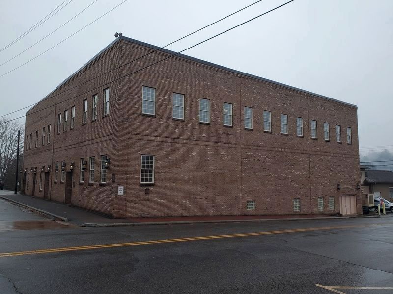 Women Mica Workers Marker below far left window facing Phillips Street image. Click for full size.
