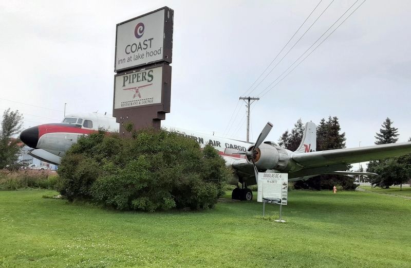 Douglas DC-6 and Marker. Click for full size. Douglas DC-6 and Marker image. Click for full size.