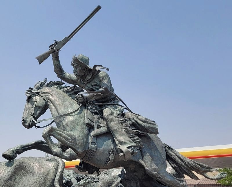 Closeup view of the Trail Boss with his rifle, chaps and spurs. Click for full size. Closeup view of the Trail Boss with his rifle, chaps and spurs image. Click for full size.