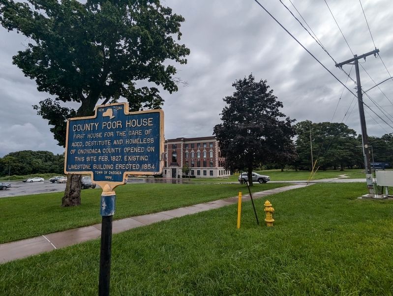 County Poor House Marker wide view including the existing structure. Click for full size. County Poor House Marker wide view including the existing structure image. Click for full size.