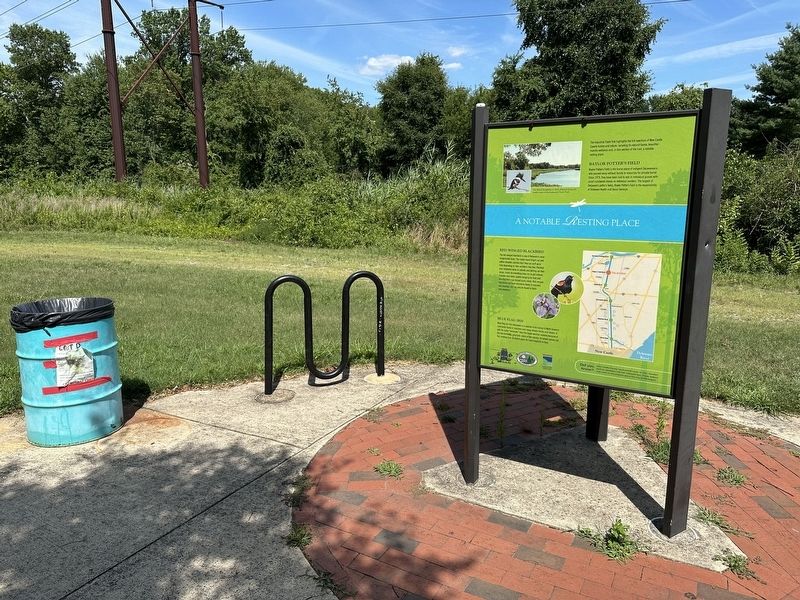 A Notable Resting Place Marker - wide view image. Click for full size.