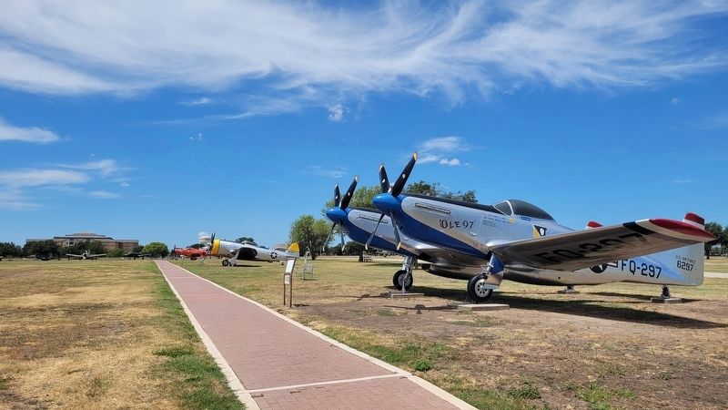 The view of the F-82E "Twin Mustang" and Marker along the air park. Click for full size. The view of the F-82E "Twin Mustang" and Marker along the air park image. Click for full size.