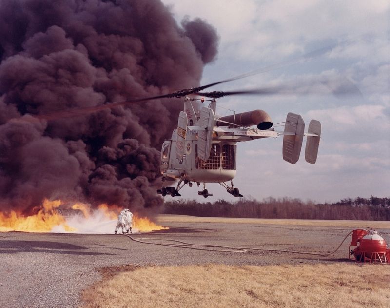 HH-43B Huskie during a firefighting exercise. Click for full size. HH-43B Huskie during a firefighting exercise image. Click for full size.