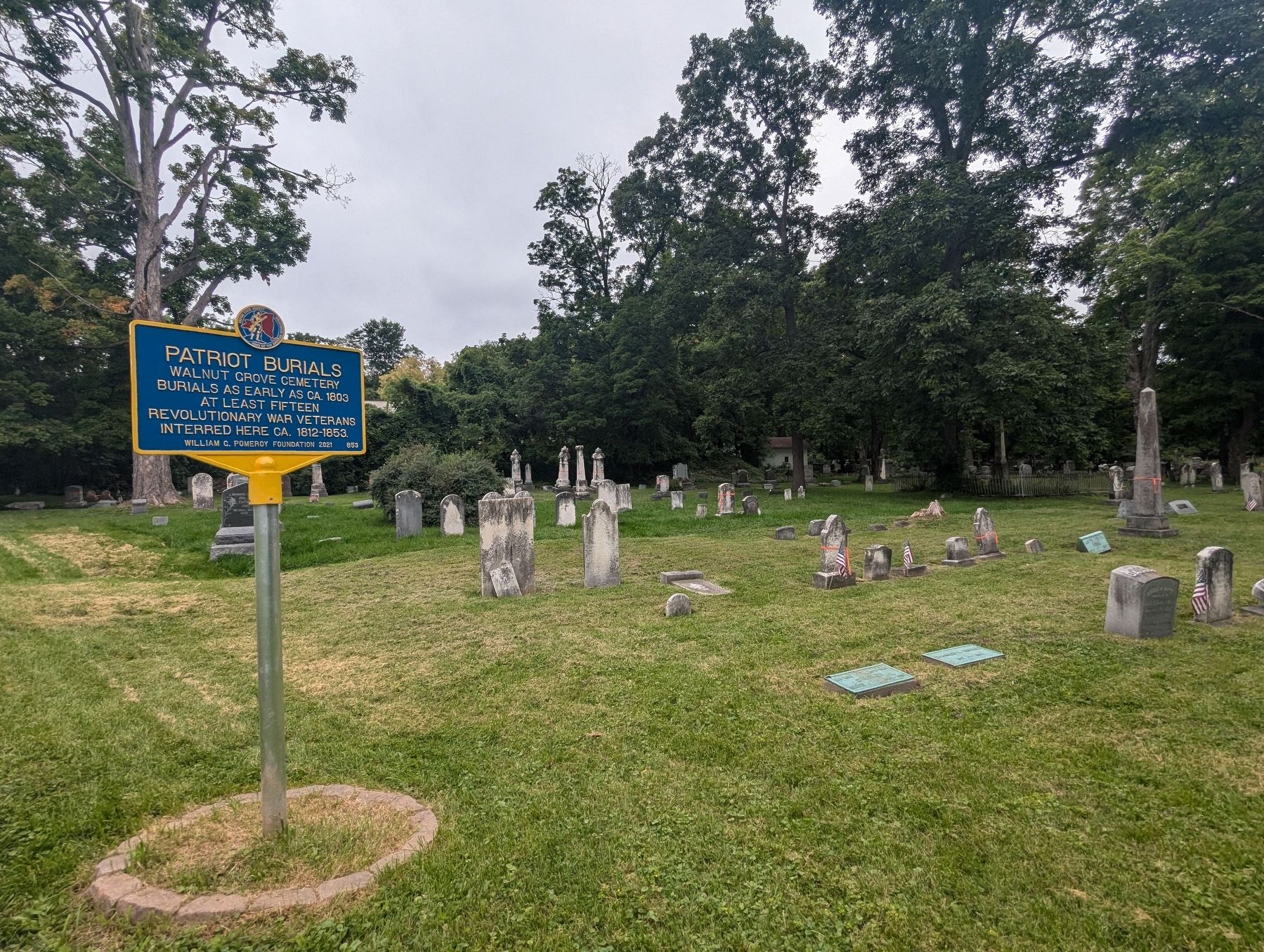 Patriot Burials Marker wider view. Click for full size. Patriot Burials Marker wider view image. Click for full size.