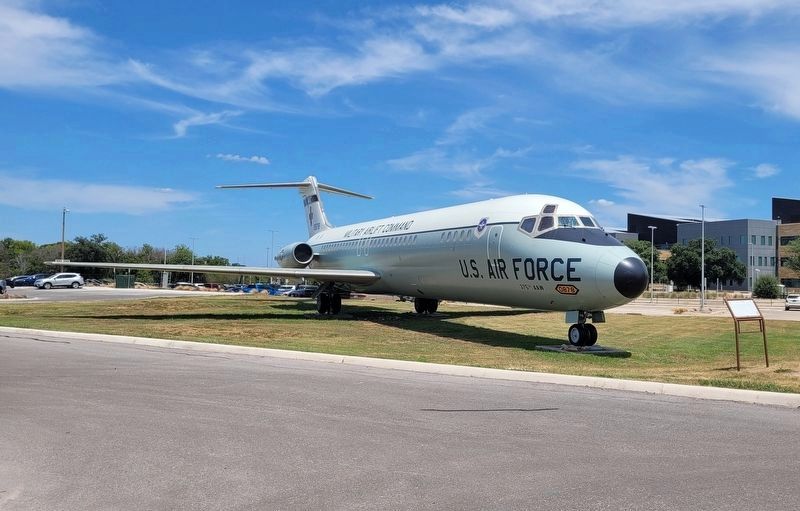 The view of the C-9A "Nightingale" and Marker from the hospital parking lot image. Click for full size.
