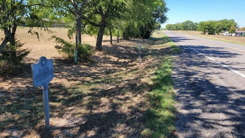 The view of the marker along the street. Click for full size. The view of the marker along the street image. Click for full size.