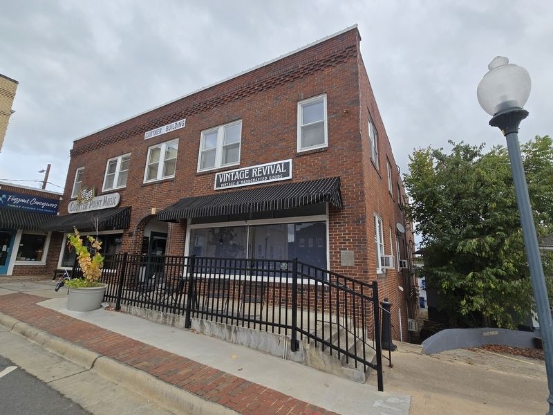 Cartner Building on the northeast corner of Court Square. Subject Marker is on the right above steps image. Click for full size.