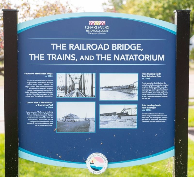 The Railroad Bridge, The Trains, and The Natatorium side of marker image. Click for full size.