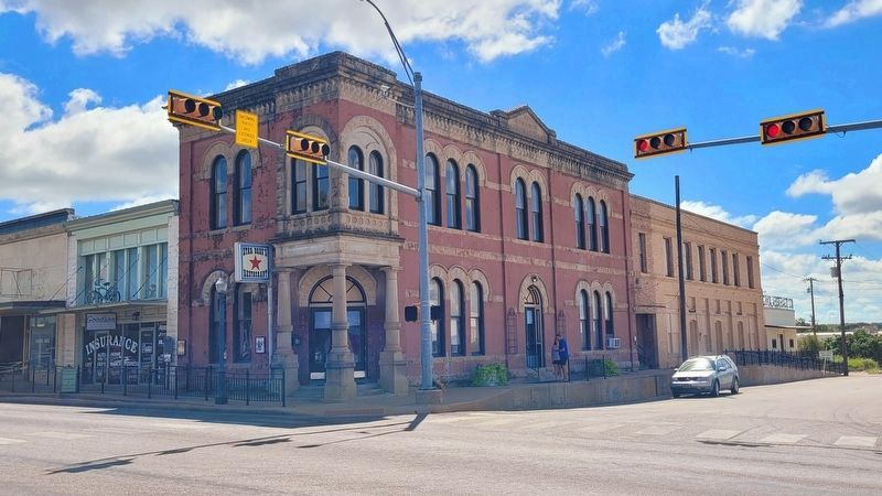 The Goodson Building is left of the corner building. image. Click for full size.