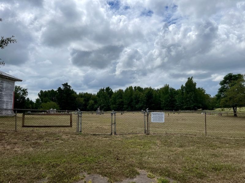 Pleasant Grove Cemetery, right side of school building image. Click for full size.
