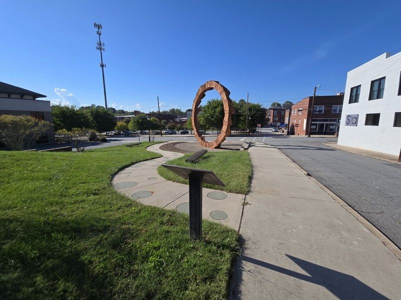 Blackwelder Park Marker, looking northwest towards the "Across the Grain" sculpture. Click for full size. Blackwelder Park Marker, looking northwest towards the "Across the Grain" sculpture image. Click for full size.
