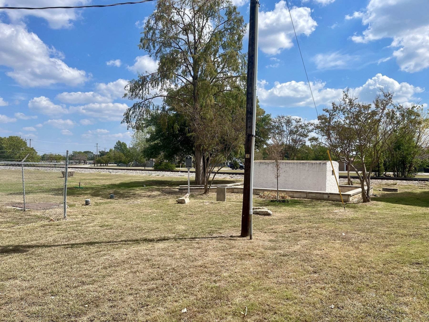 Royse City Calaboose and Marker, viewed from nearby parking image. Click for full size.