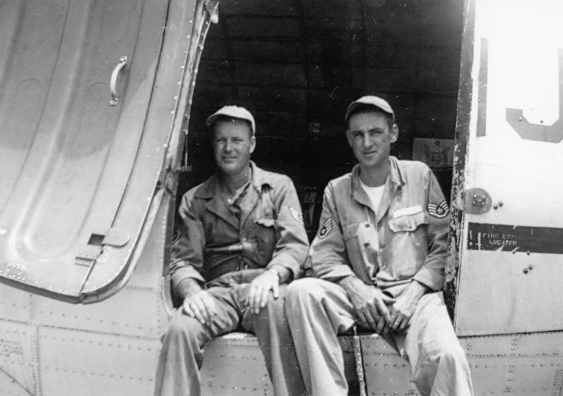 Squadron members at their PBY. Click for full size. Squadron members at their PBY image. Click for full size.
