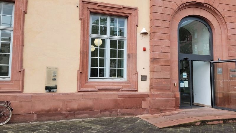 The marker at the entrance to the University building. Click for full size. The marker at the entrance to the University building image. Click for full size.