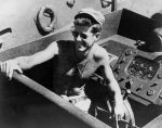 Lt. John F. Kennedy, USNR, aboard PT-109. Click for more information. Lt. John F. Kennedy, USNR, aboard PT-109 image. Click for more information.