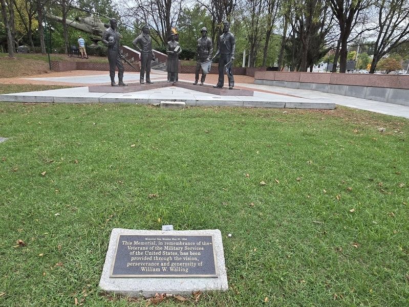 Bristol Veterans Memorial. Five statues in the background, one for each branch of the U.S. military. Click for full size. Bristol Veterans Memorial. Five statues in the background, one for each branch of the U.S. military image. Click for full size.