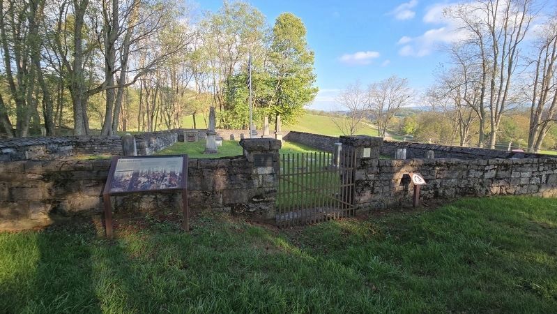 Wide view of Aspenvale Cemetery entrance. Marker to the left of the gate image. Click for full size.