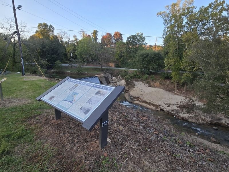 David Allen's Iron Works Marker overlooking the dam and Big Elkin Creek. Click for full size. David Allen's Iron Works Marker overlooking the dam and Big Elkin Creek image. Click for full size.