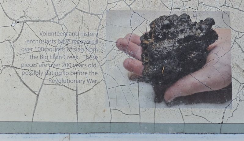 A sample of slag collected from Big Elkin Creek. Click for full size. A sample of slag collected from Big Elkin Creek image. Click for full size.
