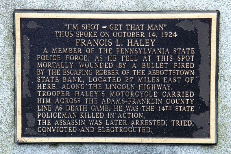 "I'm shot - get that man" plaque image. Click for full size.