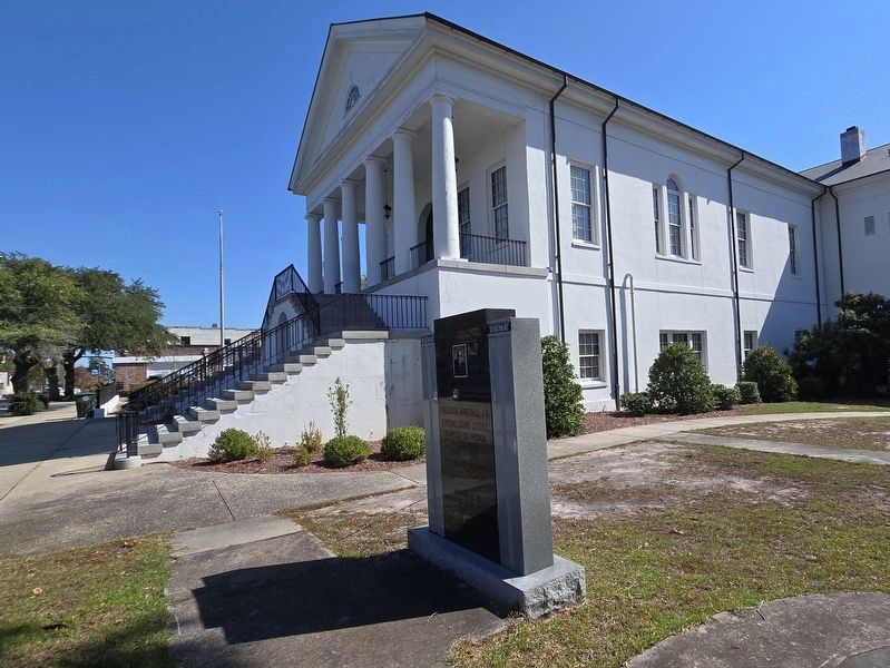 Thurgood Marshall, J.D. Marker with the Williamsburg County Courthouse in the background. Click for full size. Thurgood Marshall, J.D. Marker with the Williamsburg County Courthouse in the background image. Click for full size.