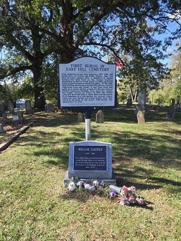 Full view of First Burial in East Hill Cemetery Marker and Nellie Gaines gravestone image. Click for full size.