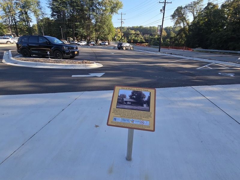 Elkin & Alleghany Railroad Depot Marker, looking towards parking lot, the former location of depot. Click for full size. Elkin & Alleghany Railroad Depot Marker, looking towards parking lot, the former location of depot image. Click for full size.