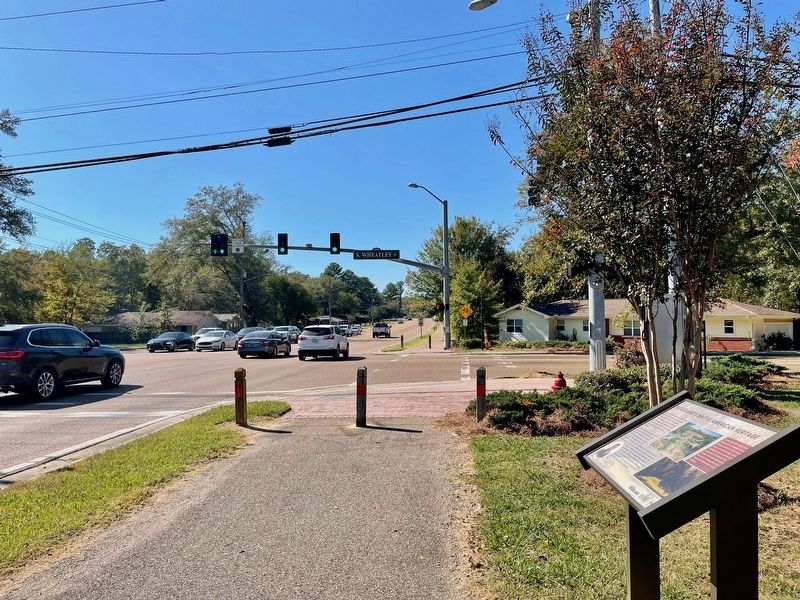 View from marker west to South Wheatley Street intersection. image. Click for full size.