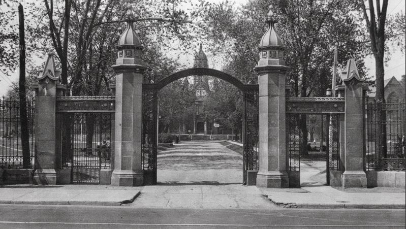 Trinity College gates, ca 1910 image. Click for full size.