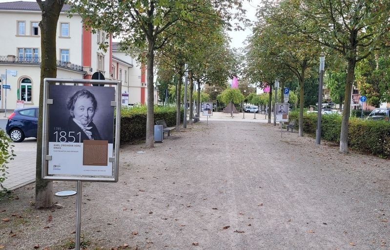 The view of the Karl (Freiherr Von) Drais Marker in the park image. Click for full size.