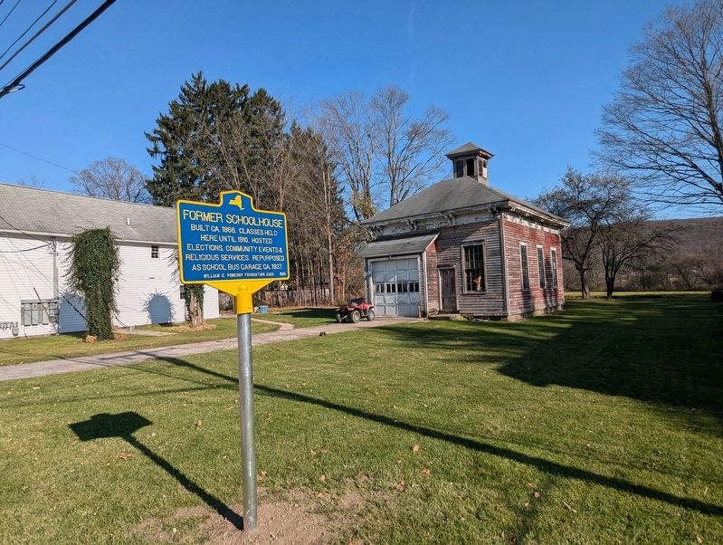 Former Schoolhouse Marker with building in the background. Click for full size. Former Schoolhouse Marker with building in the background image. Click for full size.