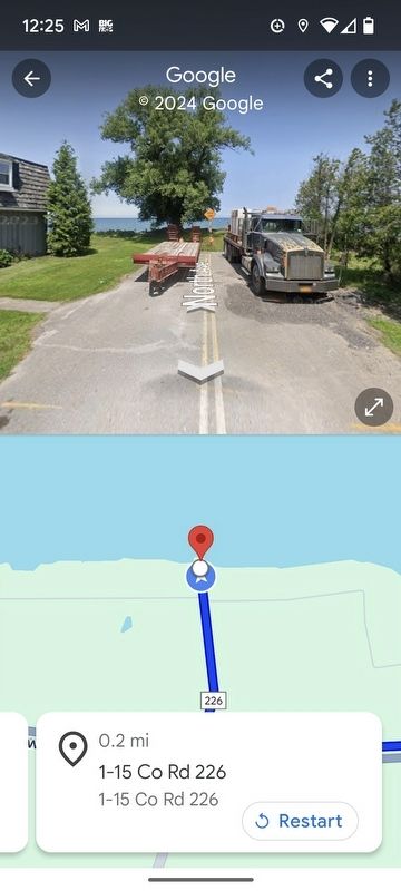 Historic Site Marker located behind the dead end sign. This is a Google shot image. Click for full size.