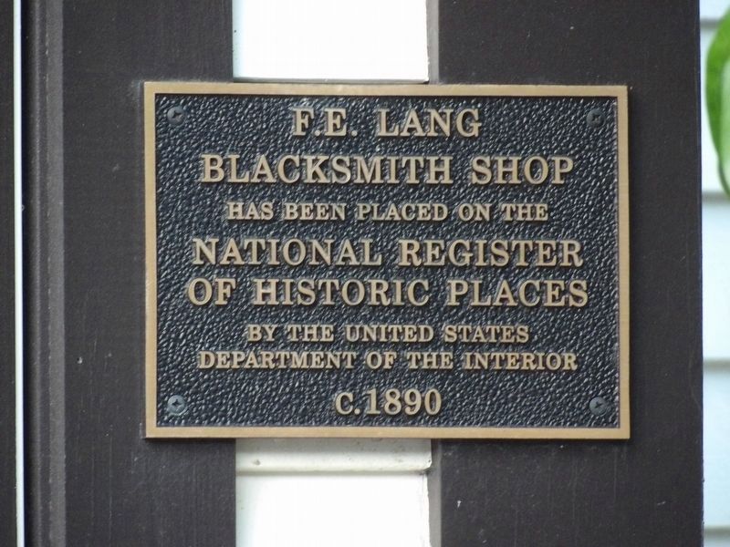 F.E. Lang Blacksmith Shop Marker. Click for more information. F.E. Lang Blacksmith Shop Marker image. Click for more information.