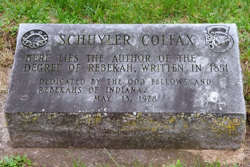 This memorial sits between the grave and the marker.. Click for full size. This memorial sits between the grave and the marker. image. Click for full size.